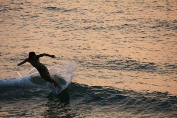 surfer wave beach