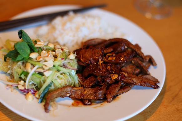 thai grilled beef with green papaya salad and rice