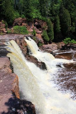 vertical view of the falls at gooseberry falls state park minnesota