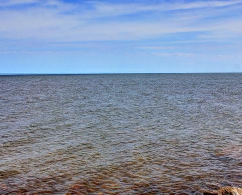 waters and horizon of lake superior at mcclain state park michigan