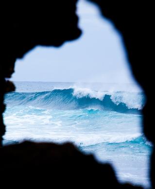 waves through rock window