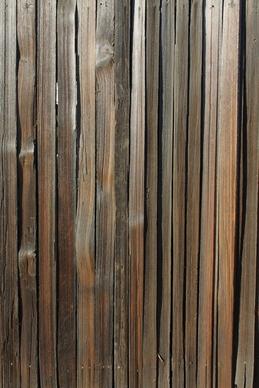 weathered wood slat fence