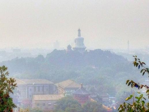 white pagoda in the pollution in beijing china