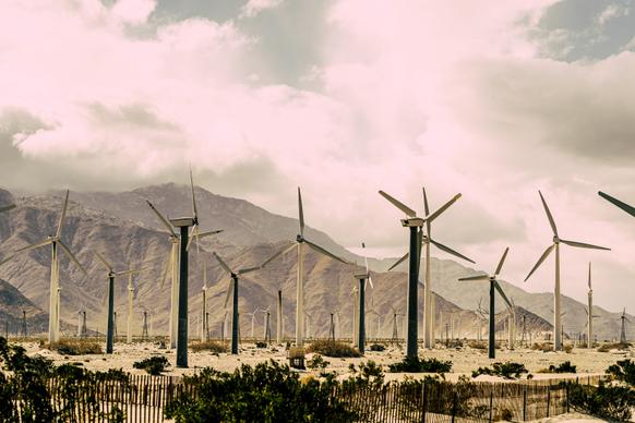 windfarm scenery picture contrast cloudy sky mountain land