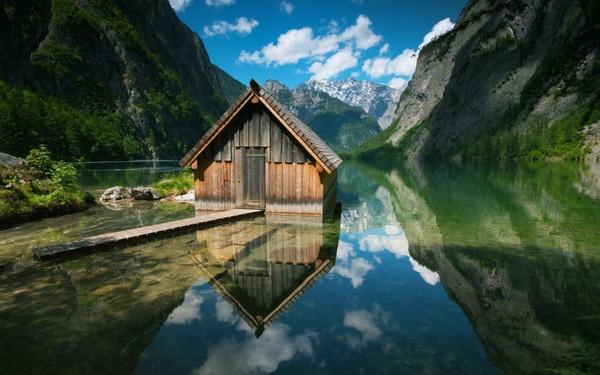 wooden houses lakes mountains
